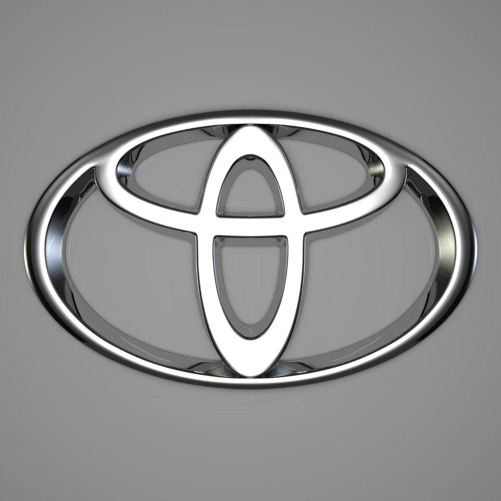Chrome Toyota logo on a gray background