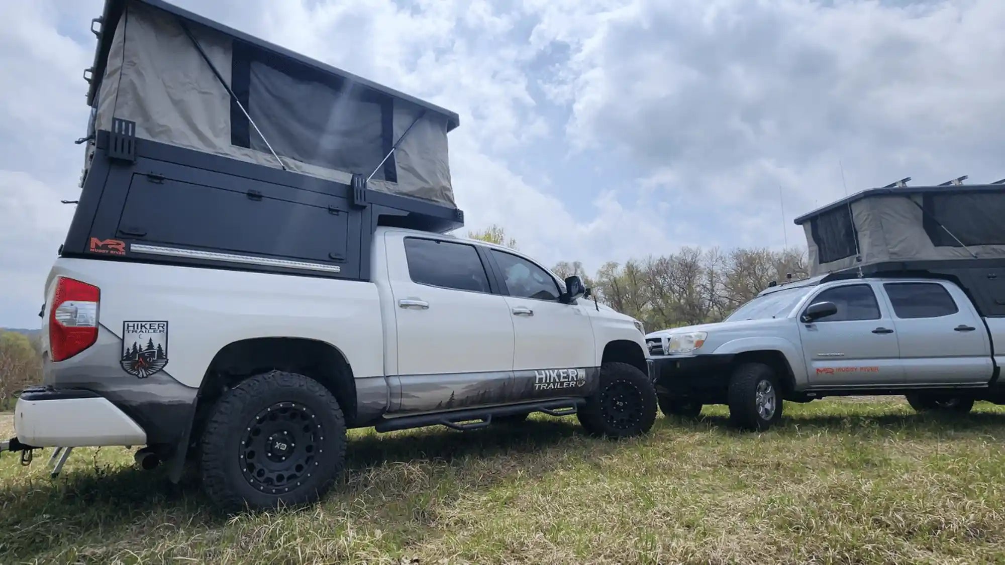 off road truck camper builds on lifted pickups with pop up campers designed for overlanding and outdoor travel