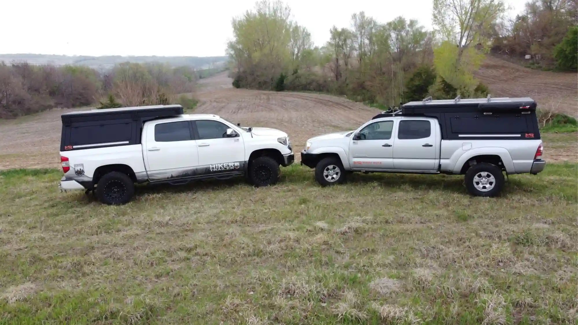 Side-by-side view of wedge truck campers vs popup camper shells on two trucks demonstrating differences in roof height and camping configurations.
