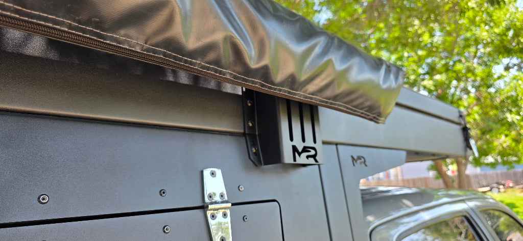 Roof rack system on a vehicle with a clear sky background