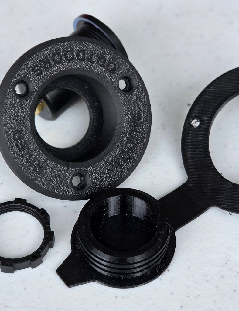 Power Plug Mount and Cover kit showing mounting hardware and threaded components for outdoor electrical setups