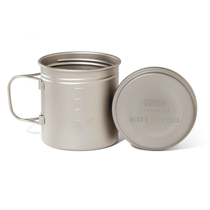 Titanium mug with handle and lid on a white background