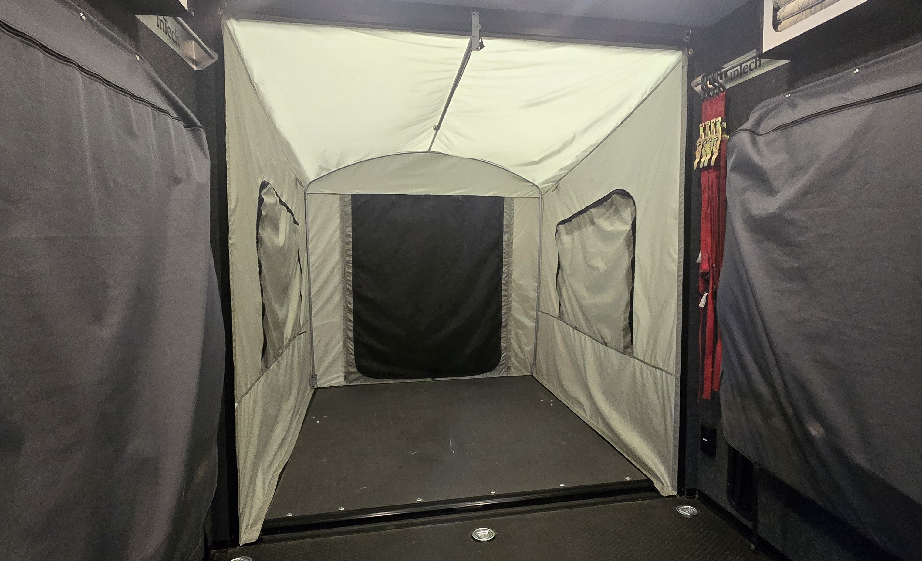 Toy Hauler Patio Enclosure Ramp Tent by PahaQue.  Custom Built to fit all Toy Hauler trailers.